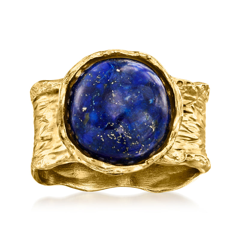 Wide gold-tone ring with oval lapis lazuli cabochon in a raised bezel