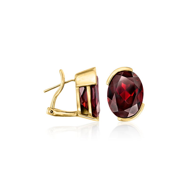 Oval garnet clip/post earrings with 14kt yellow gold oval bezel settings