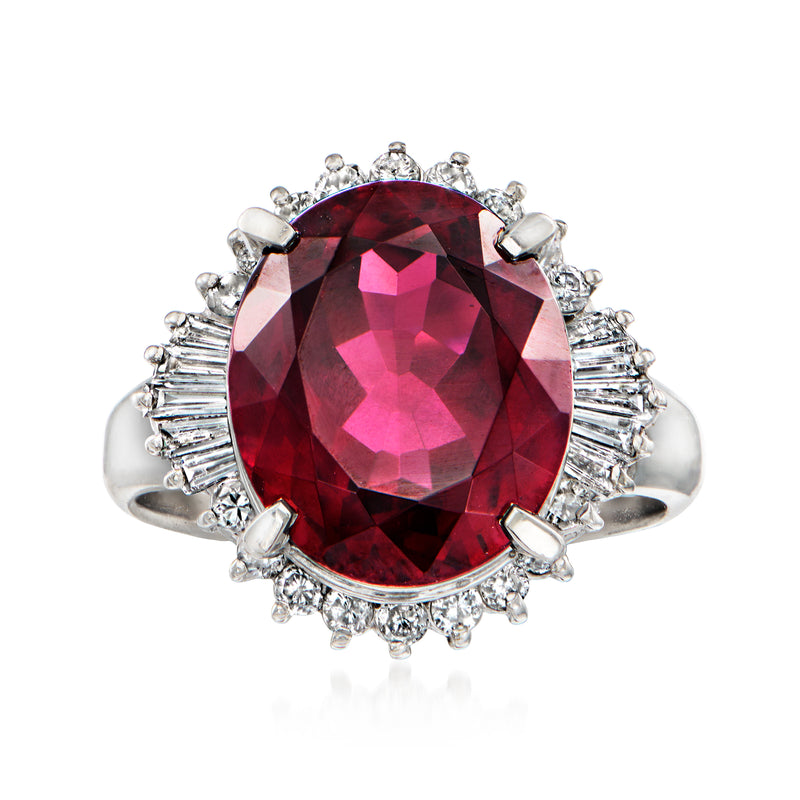 Vintage platinum ring with large oval rhodolite garnet and diamond halo shoulders