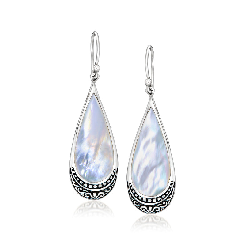 Sterling silver teardrop earrings with iridescent mother-of-pearl and ornate edge detailing
