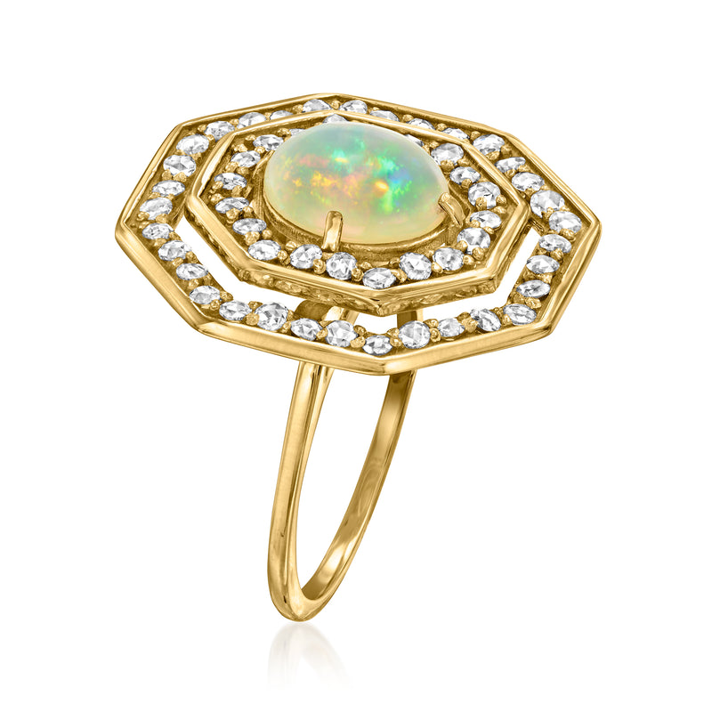 Opal and diamond ring in 18kt yellow gold with octagonal halo setting
