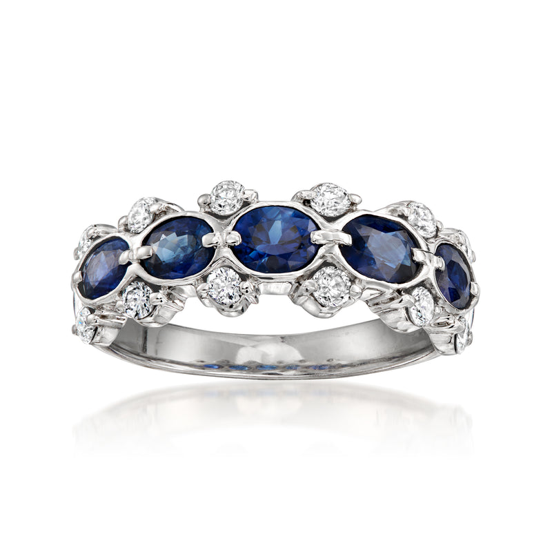 Platinum vintage ring with oval blue sapphires and round diamonds, prong-set band