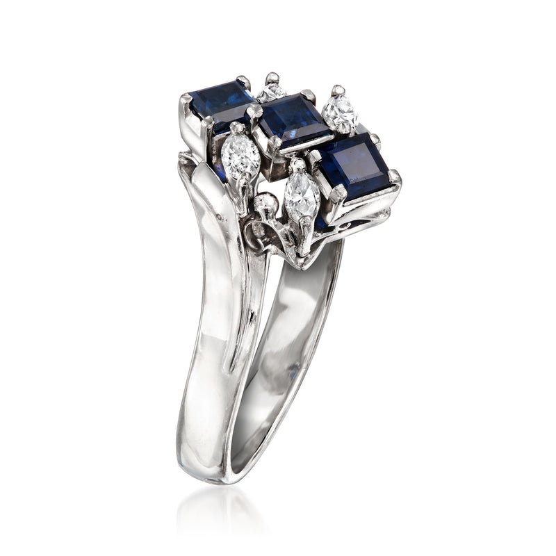 Platinum ring with three square sapphires and diamond side stones