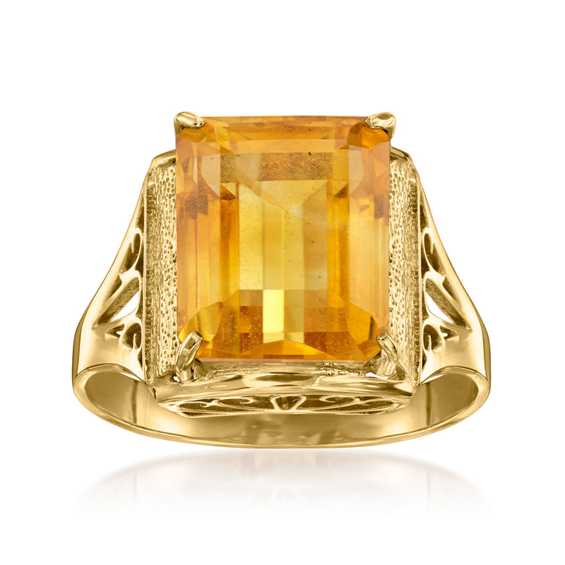 Vintage 18kt yellow gold citrine ring with large square-cut gemstone setting.