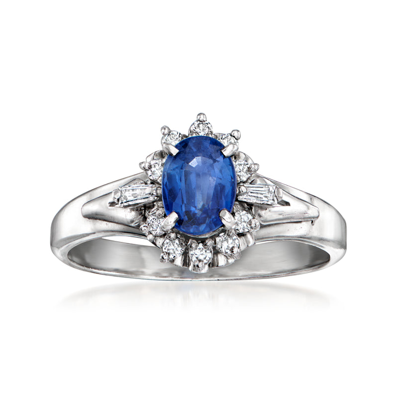 Platinum vintage sapphire and diamond oval ring with blue center stone and halo