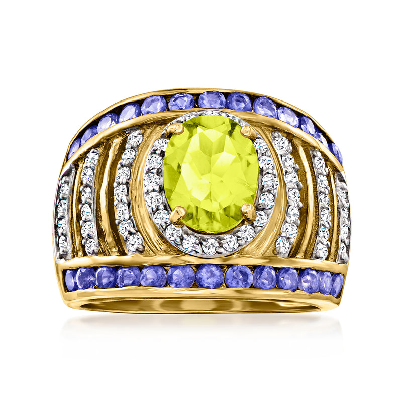 Gold statement ring with oval lime-green center stone, blue-purple border, white stones