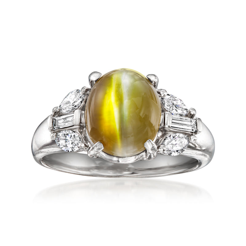 Platinum vintage ring with yellow cat's-eye cabochon and diamond side stones