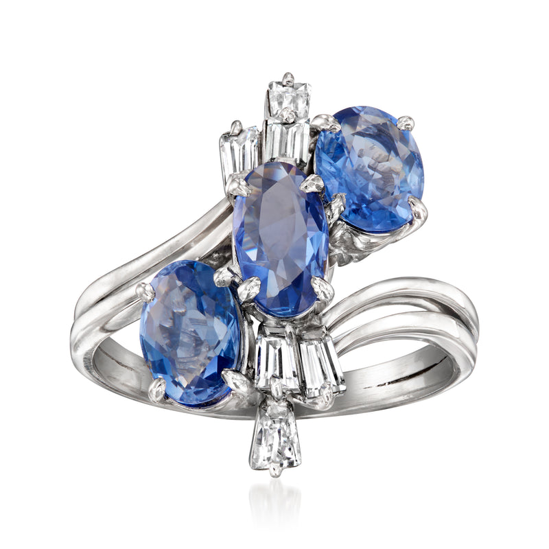 Platinum vintage ring with oval sapphire and baguette diamonds, blue center stones