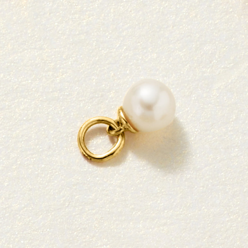 14kt yellow gold cultured pearl hoop charm with round white pearl on small clasp