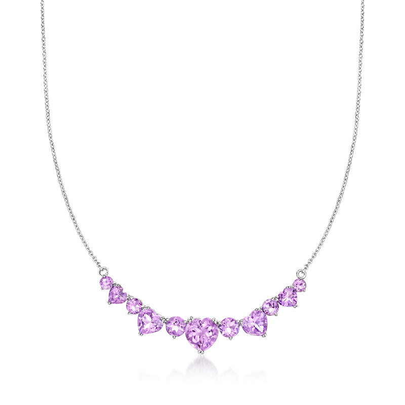 Sterling silver necklace with heart-shaped purple amethyst stones on a chain