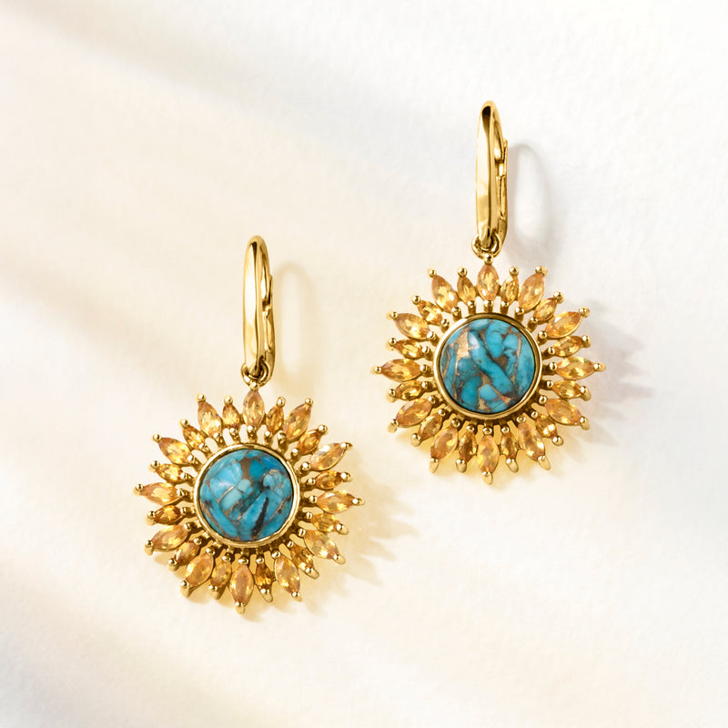 Sunflower drop earrings with gold sunburst frame, turquoise cabochon, lever backs