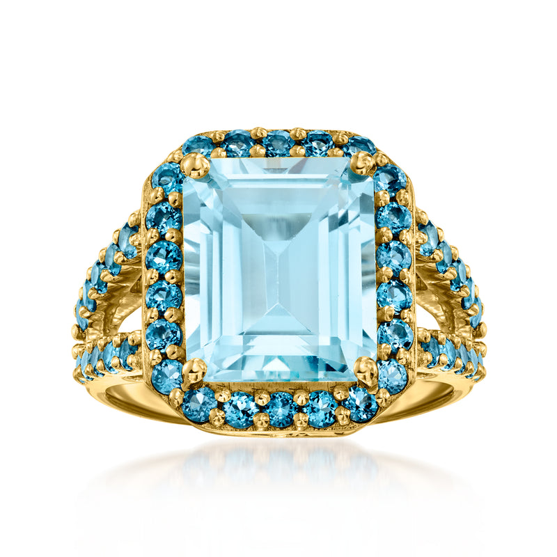 18kt gold over sterling ring with large light blue topaz center and blue topaz halo