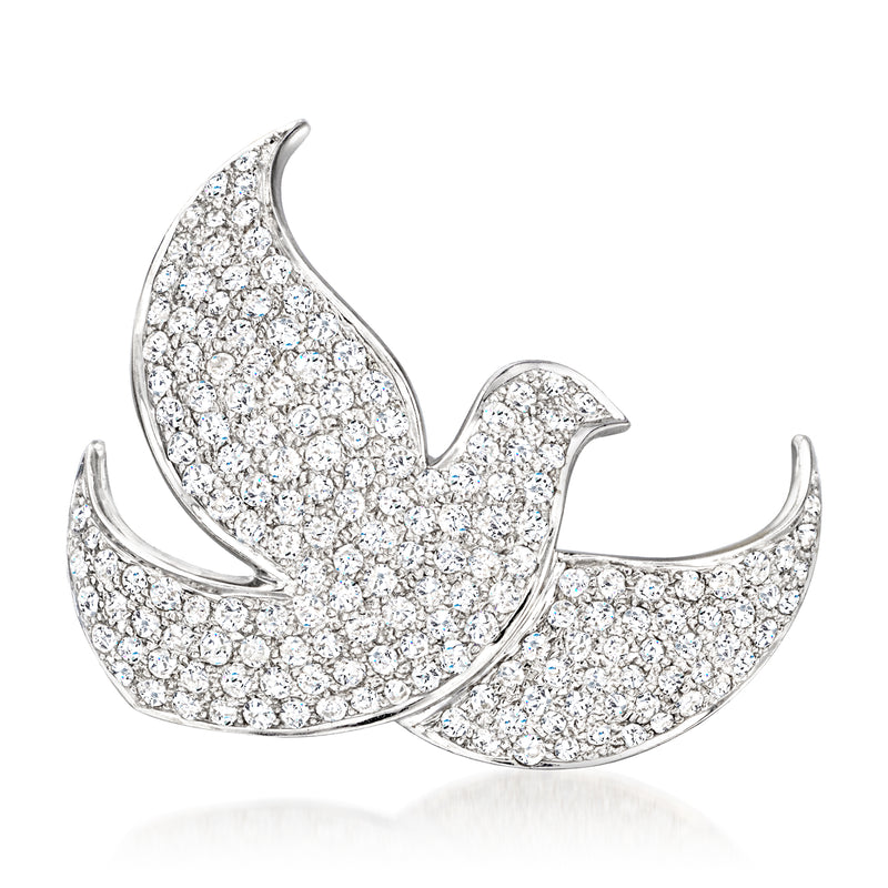 Diamond dove pin in white gold, pave-set stones with curved wing details
