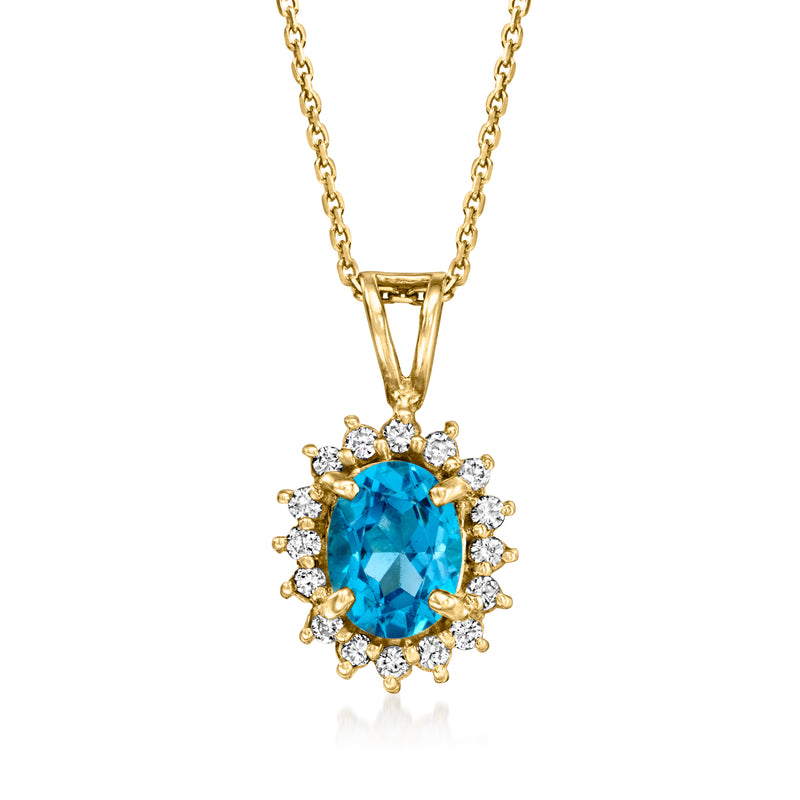 14kt yellow gold pendant necklace with oval blue topaz and diamond halo center