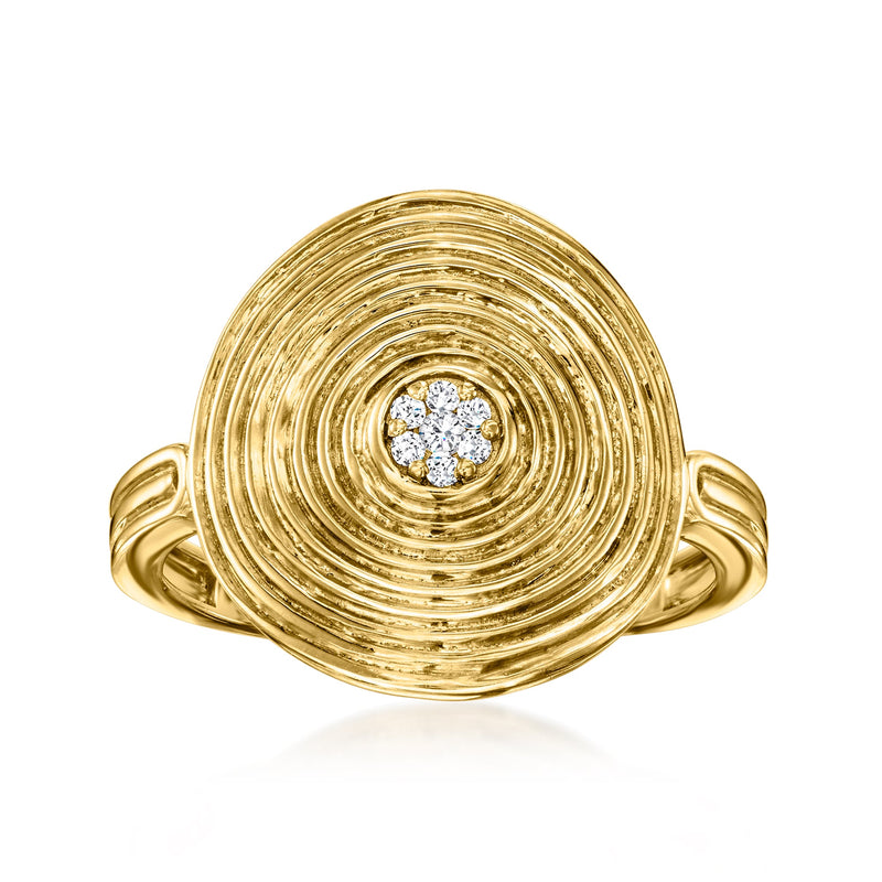 Gold ripple swirl ring with a round diamond cluster in raised bezel