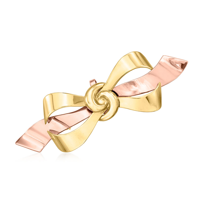 Vintage two-tone gold bow pin with rose-gold ribbon and gold center loop