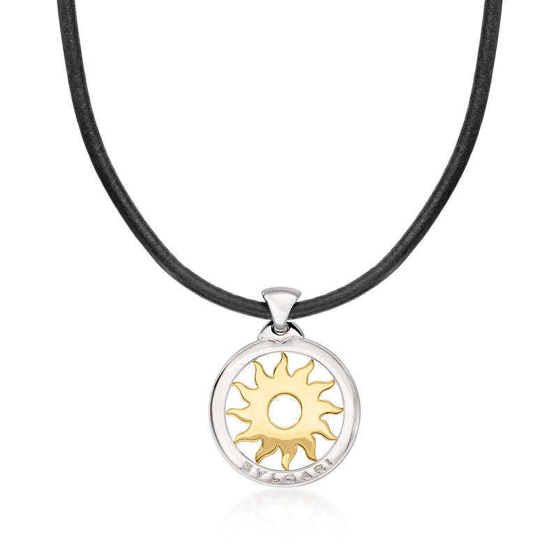 Sun pendant necklace with yellow gold sun in silver frame on black cord