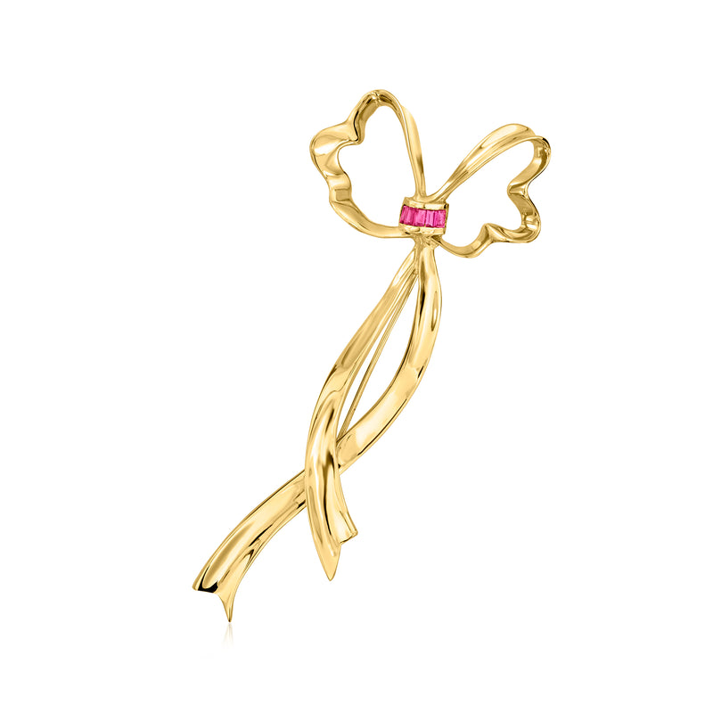 18kt yellow gold ribbon pin with ruby accents, sculpted bow design