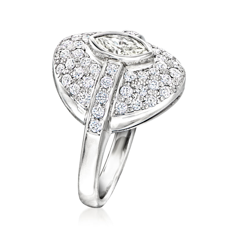 Vintage platinum diamond ring with marquise center and pavé shoulders