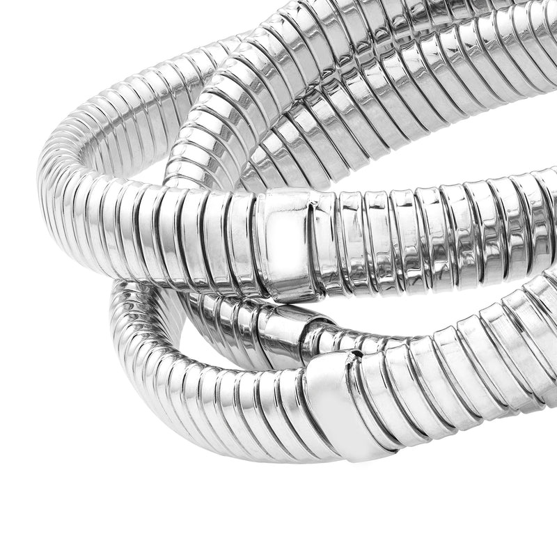 Sterling silver tubogas coil bracelet detail with polished clasp and ridged links