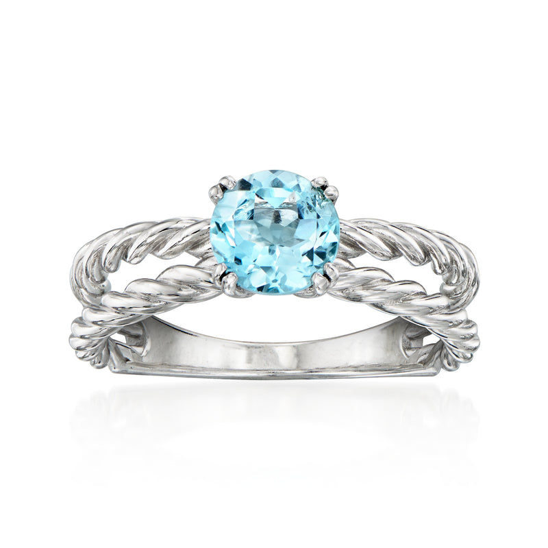 Sterling silver ring with oval sky blue topaz and twisted rope band