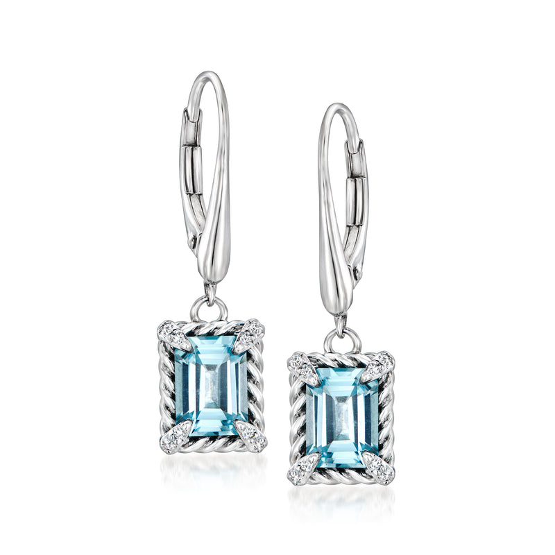 Sterling silver leverback drop earrings with blue topaz and white stone halo, cube setting