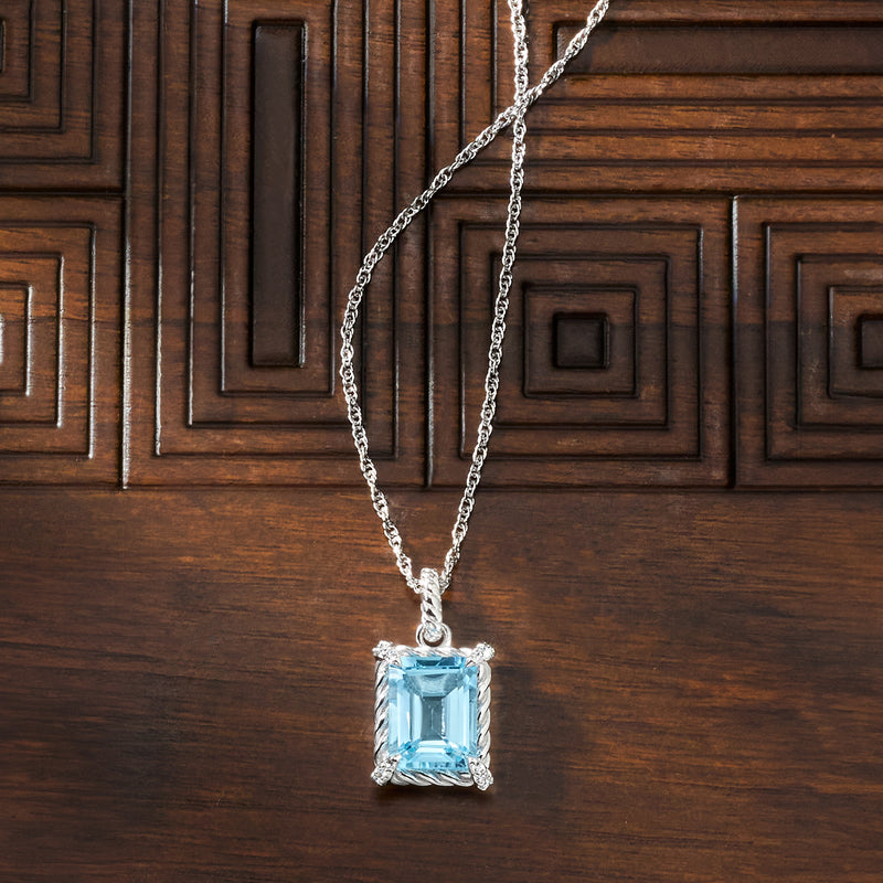 Sterling silver pendant necklace featuring a square sky blue topaz centerpiece