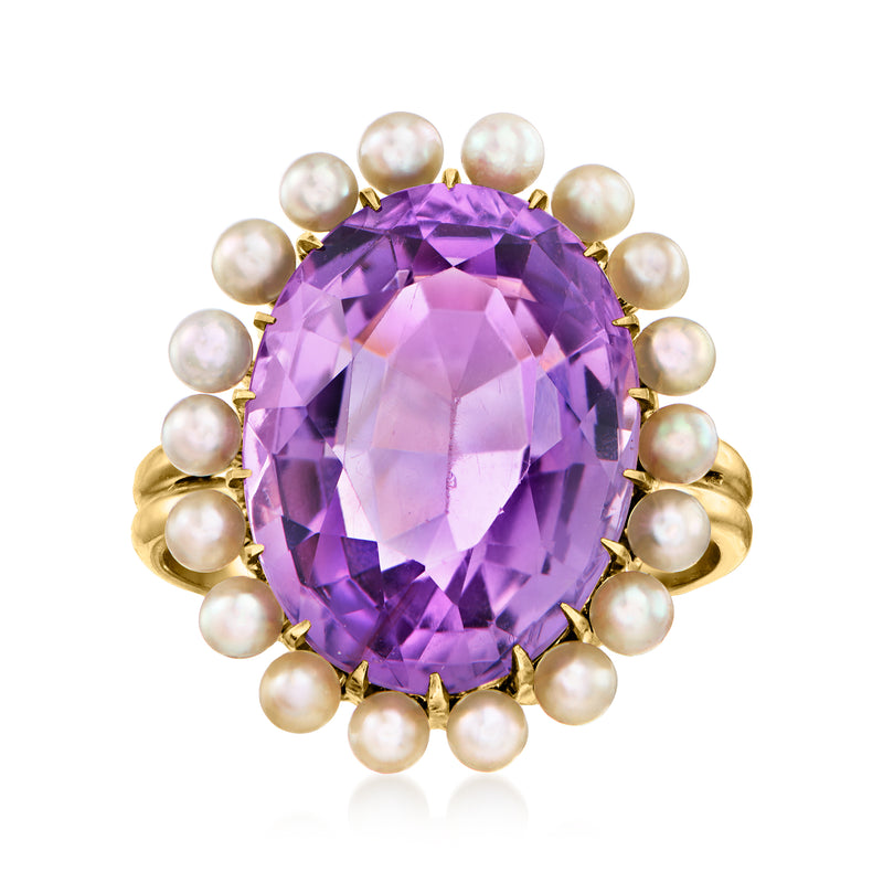 Oval amethyst ring with 14kt yellow gold setting and white cultured pearl halo