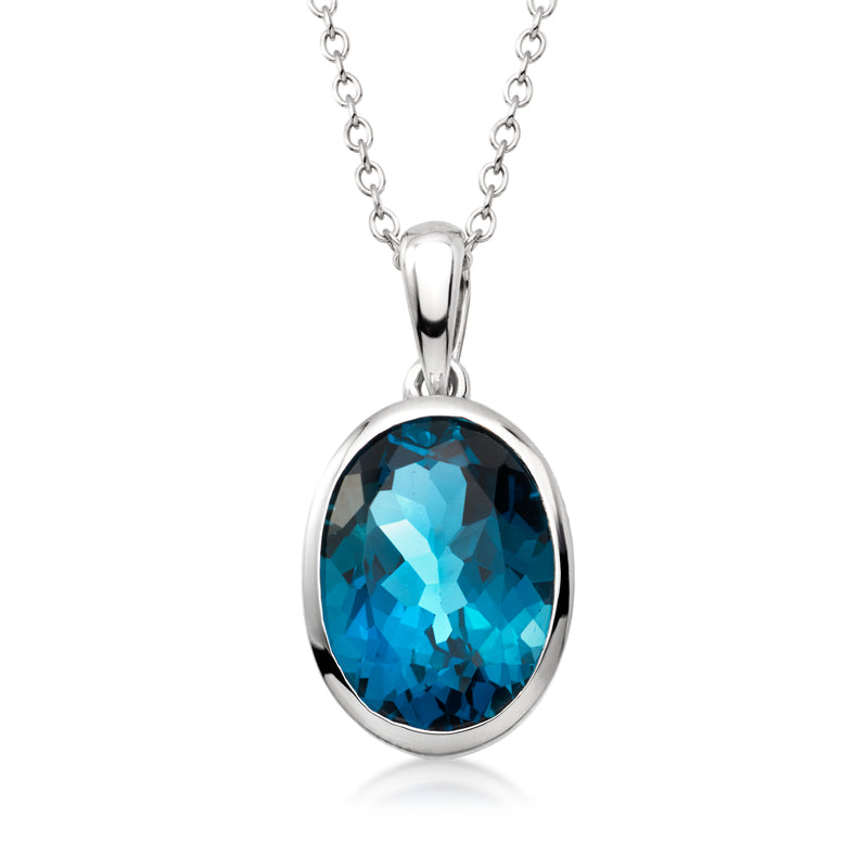 Sterling silver oval blue topaz pendant necklace with oval gemstone on chain