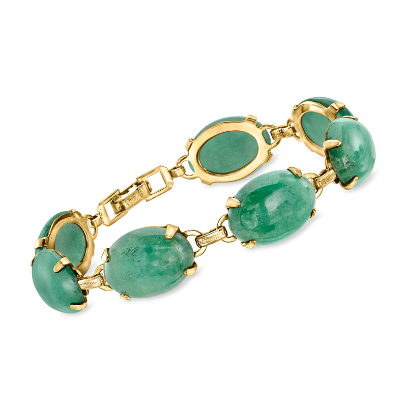 Vintage jade link bracelet in 14kt yellow gold with oval green cabochon stones