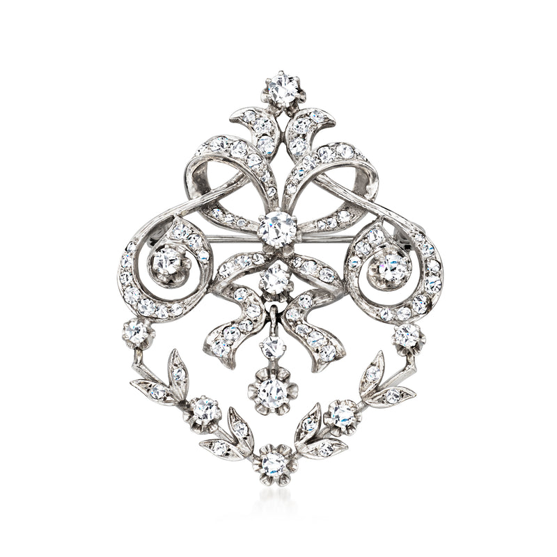 Vintage diamond fancy pin in 14kt white gold, ornate floral cluster with central round stone