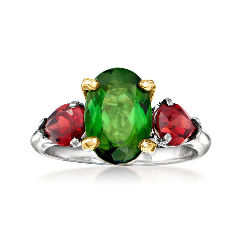 Vintage gemstone ring with large green tourmaline center, red garnet side stones, gold and platinum