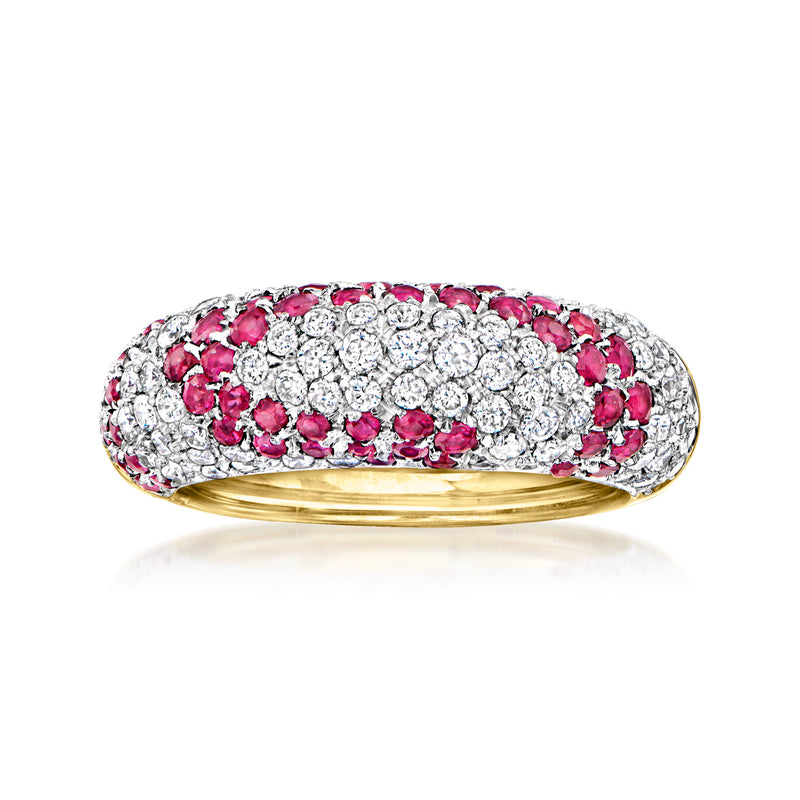 18kt yellow gold swirl ring with ruby and diamond pavé