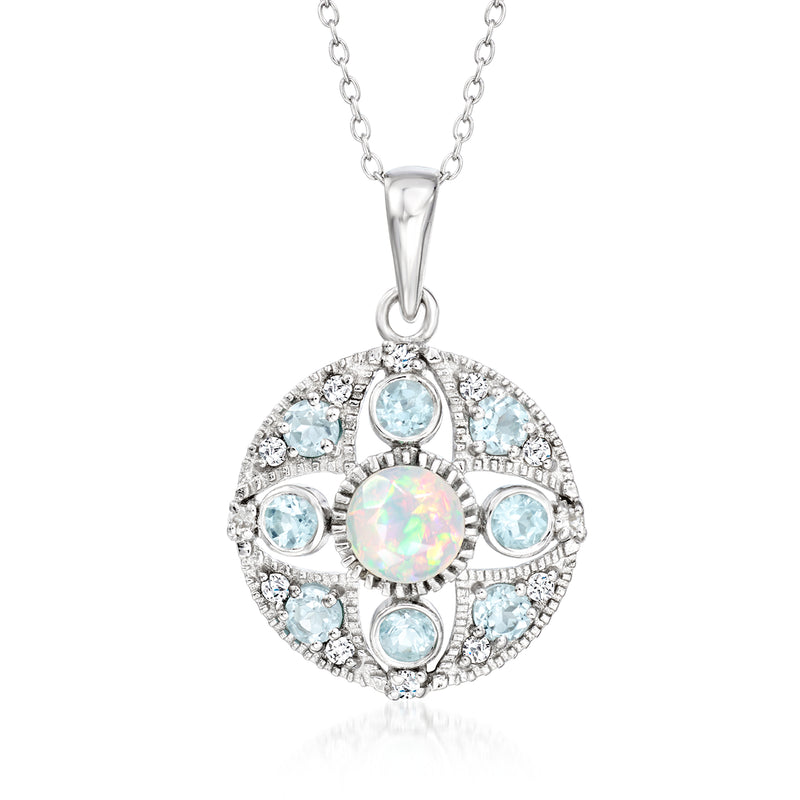 Sterling silver pendant necklace with opal center, sky-blue topaz stones, and zircons