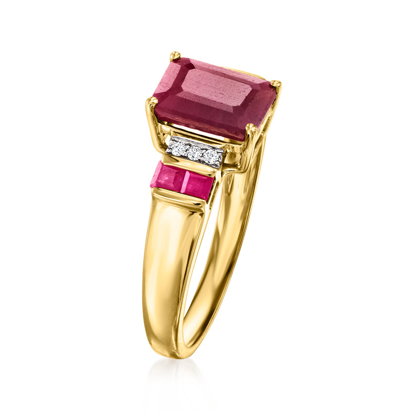 Yellow gold ring with square ruby centerpiece, diamond accents on the sides, raised setting
