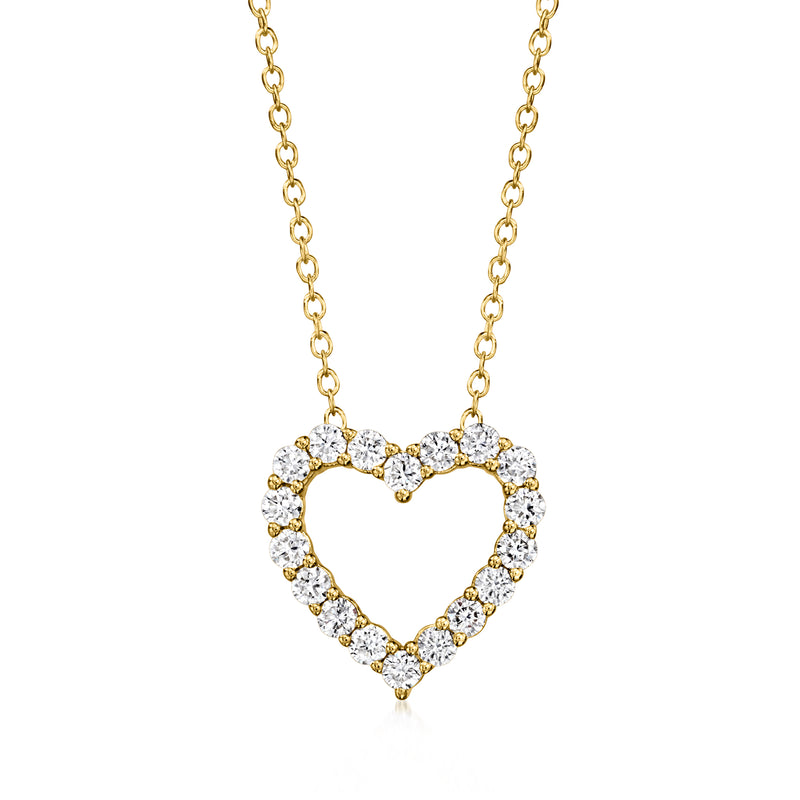 Gold heart pendant necklace with pave-style clear stones on a fine chain