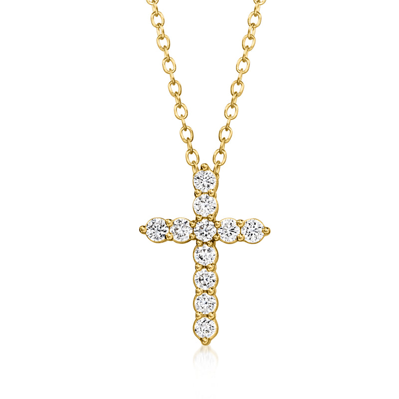 Gold cross pendant necklace with small round diamond accents on a fine chain