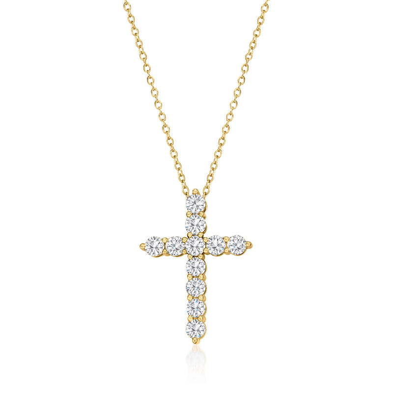 Gold cross pendant necklace with round diamond accents on a link chain