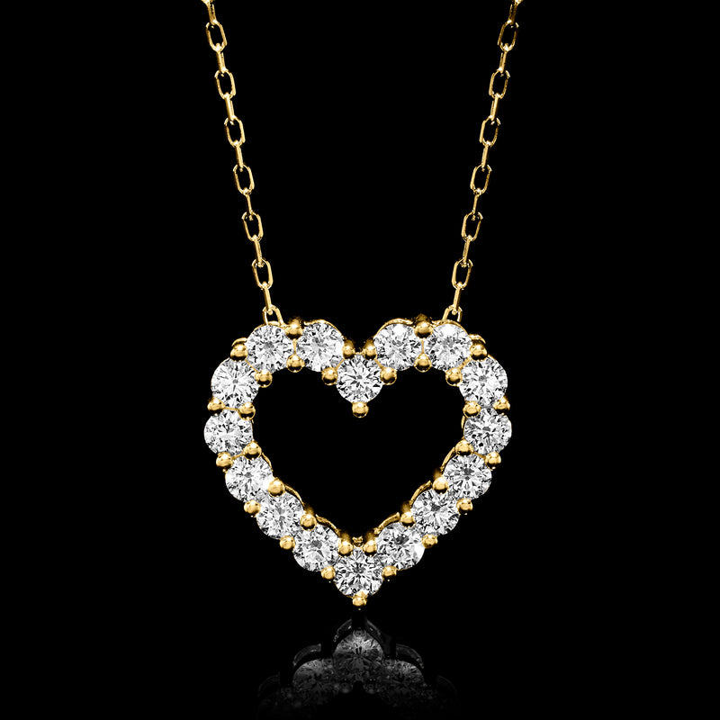 Gold heart pendant necklace with sparkling round stones, hanging on chain