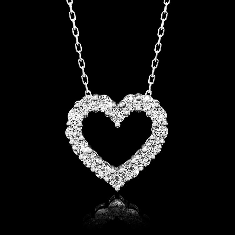 Sterling silver heart pendant with clustered round diamonds on a chain