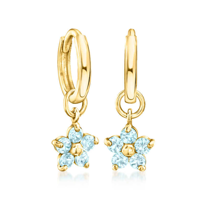 Front view of 14kt yellow gold flower hoop charm earrings with blue Topaz clusters