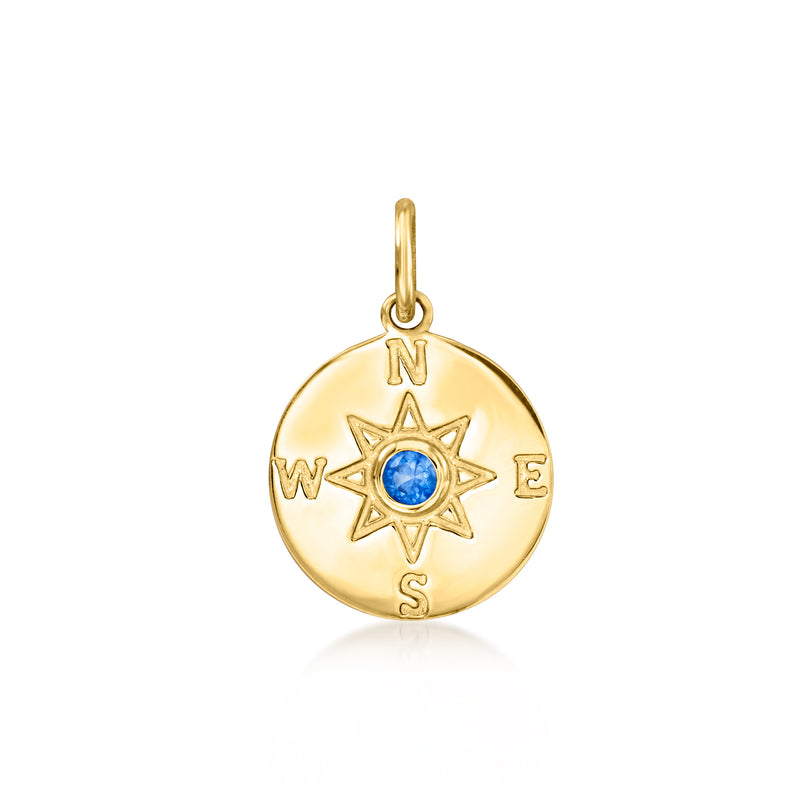 14kt yellow gold compass charm with blue center star gemstone