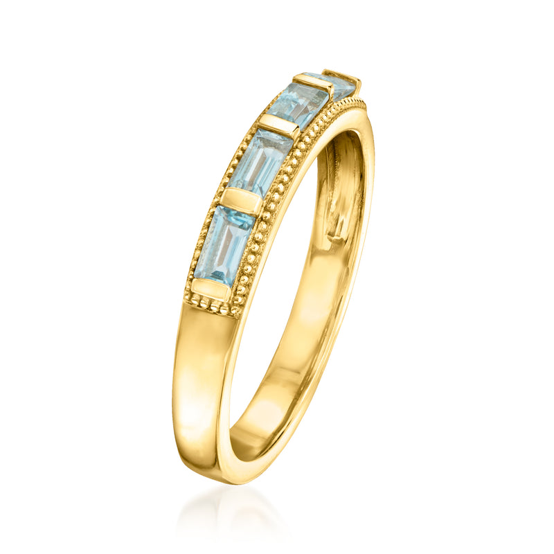 18kt gold over sterling ring with sky-blue rectangular topaz stones on slim gold band