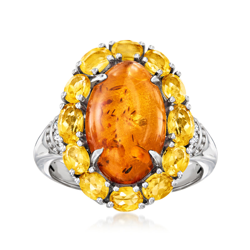 Oval amber/orange citrine gemstone ring in sterling silver with yellow and white stones