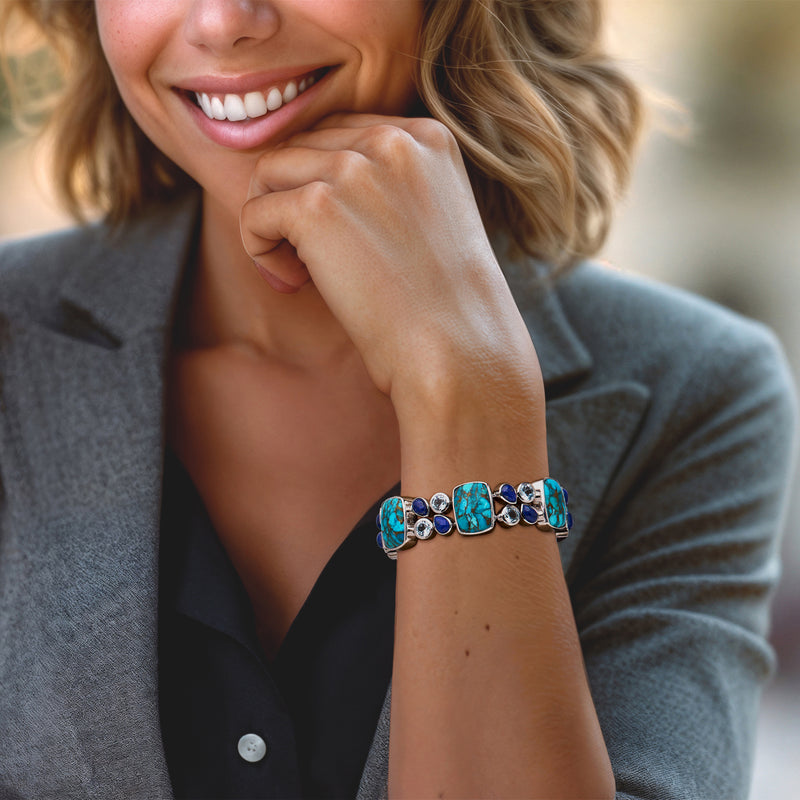 Turquoise and blue lapis gemstone bracelet on wrist in sterling silver with light blue stones