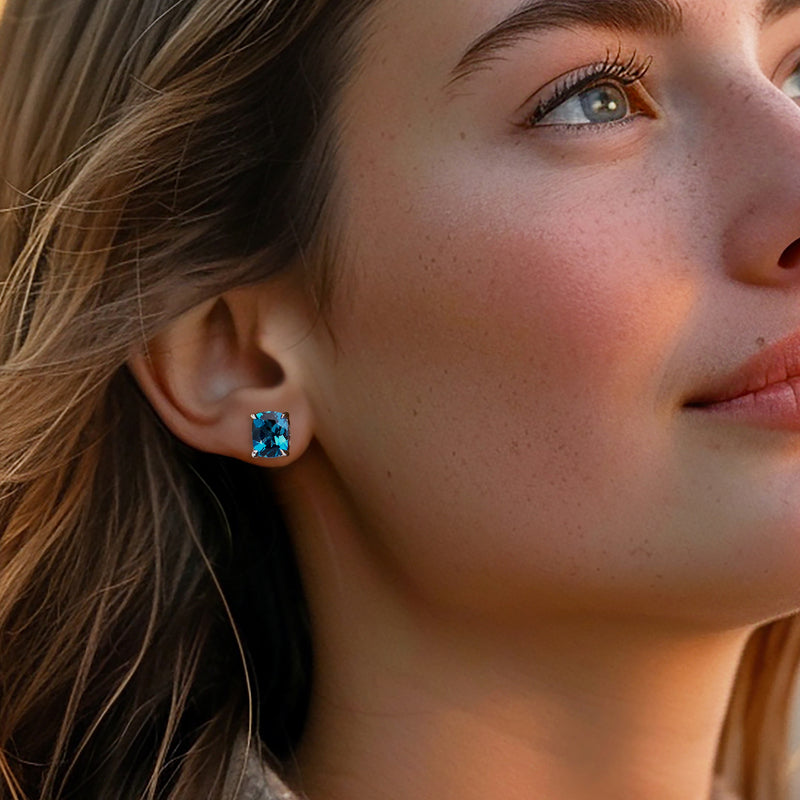 Blue topaz stud earrings in sterling silver, square-cut with sparkle settings