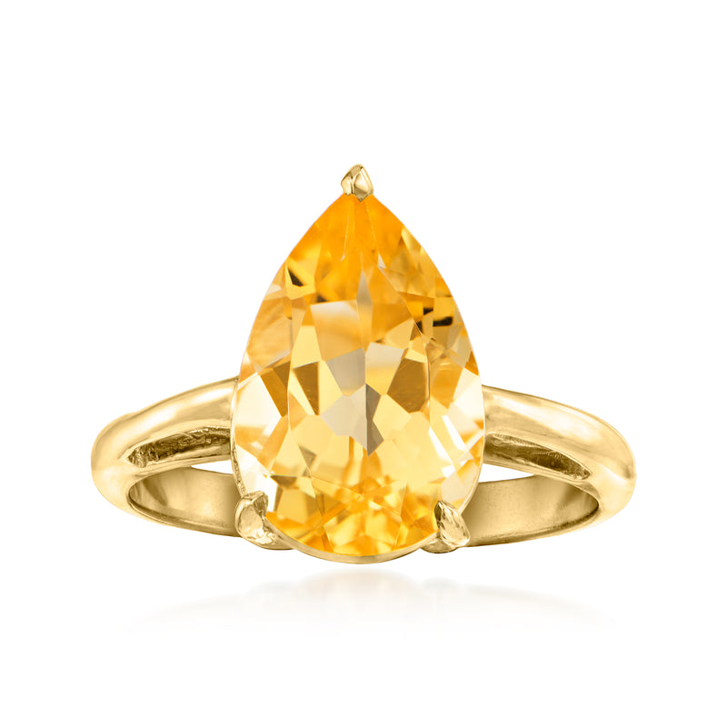 Pear-cut citrine ring with gold band and bezel setting