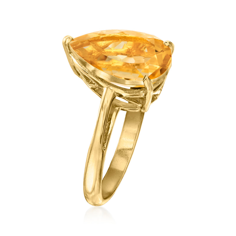 Pear-cut citrine ring with gold bezel and slender band, side view