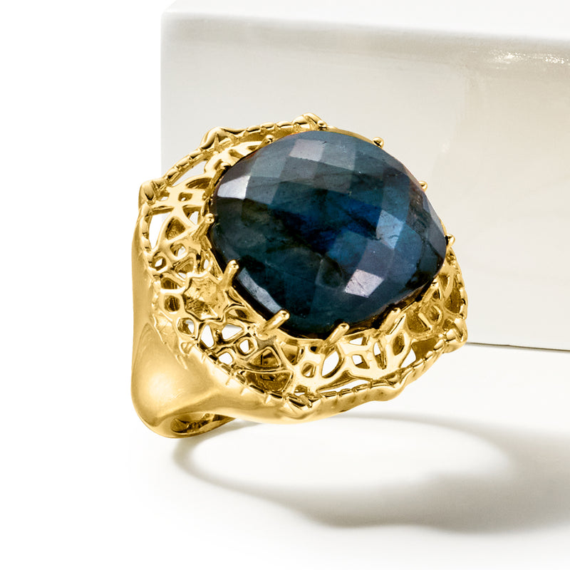 Gold over sterling labradorite ring with oval dark blue stone in openwork bezel