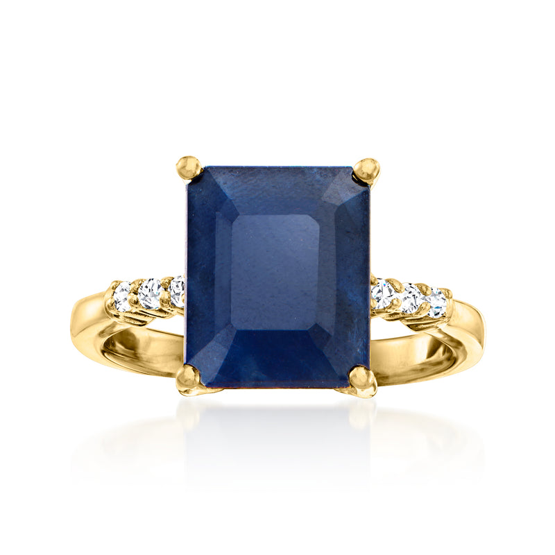 Gold-tone ring with large blue square sapphire and white zircon side accents.